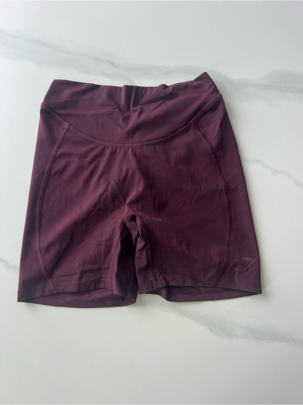 Gymshark plum dipped v waistband shorts